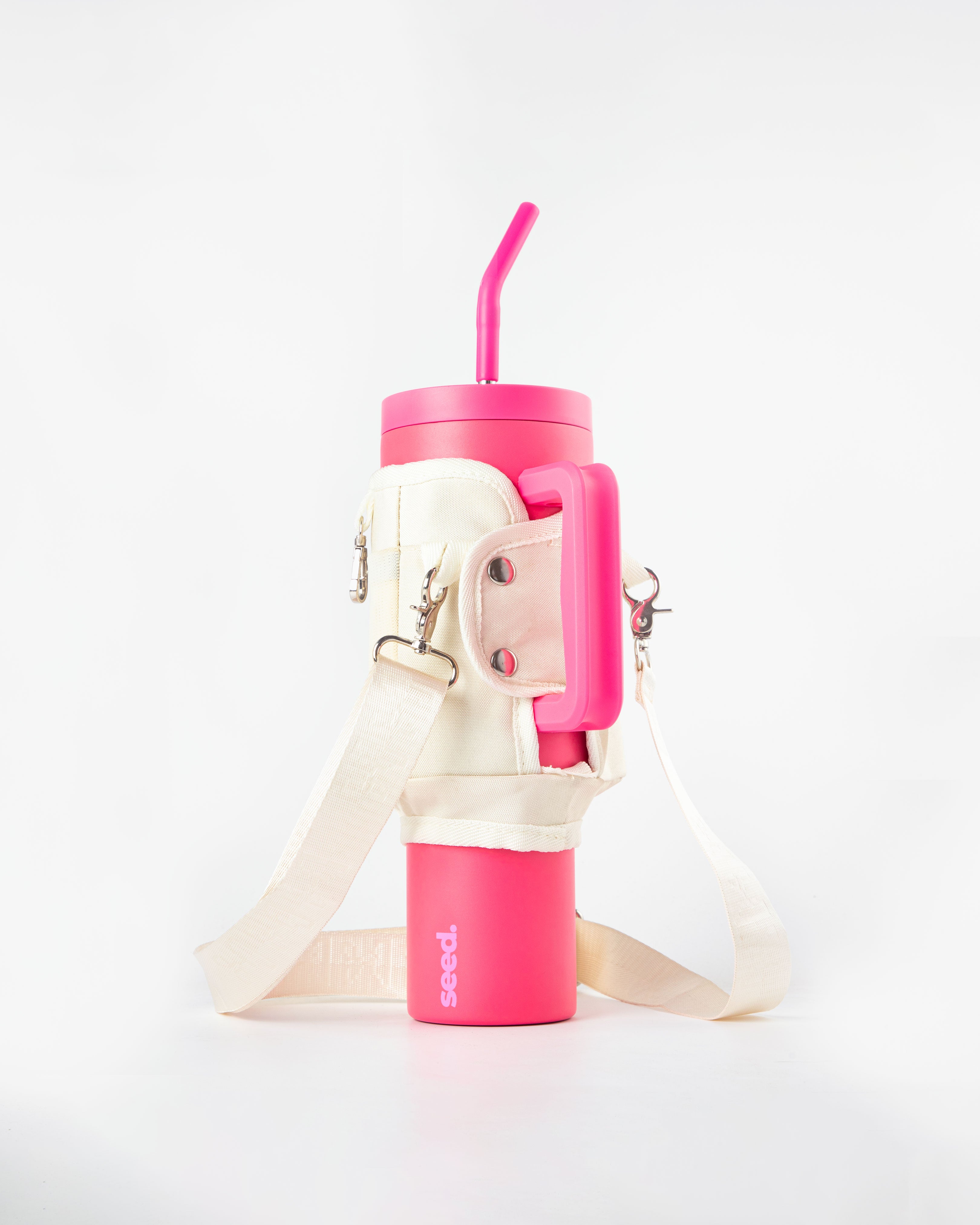 Pink and beige water bottle with straw on a white background 1.2l-stainless-steel-tumbler-hot pink-carry-all-sleeve-white-back rani pink & milkyway