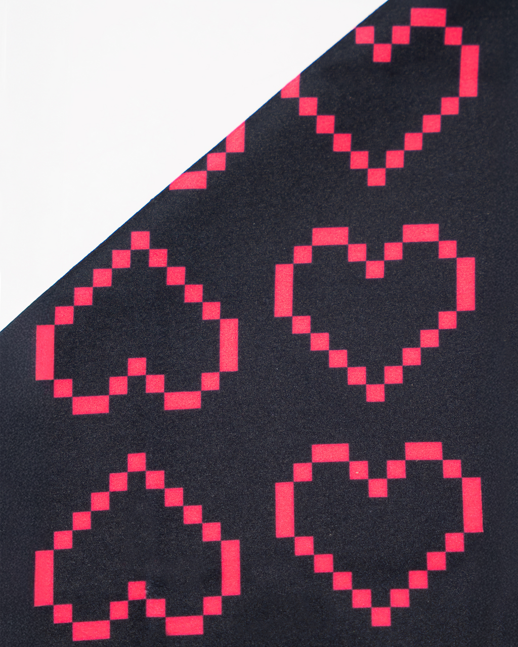 black polyester fabric with pink pixelated hearts pattern Hold Up Magic Self Adhesive Wrap Organiser Tell Tale Heart