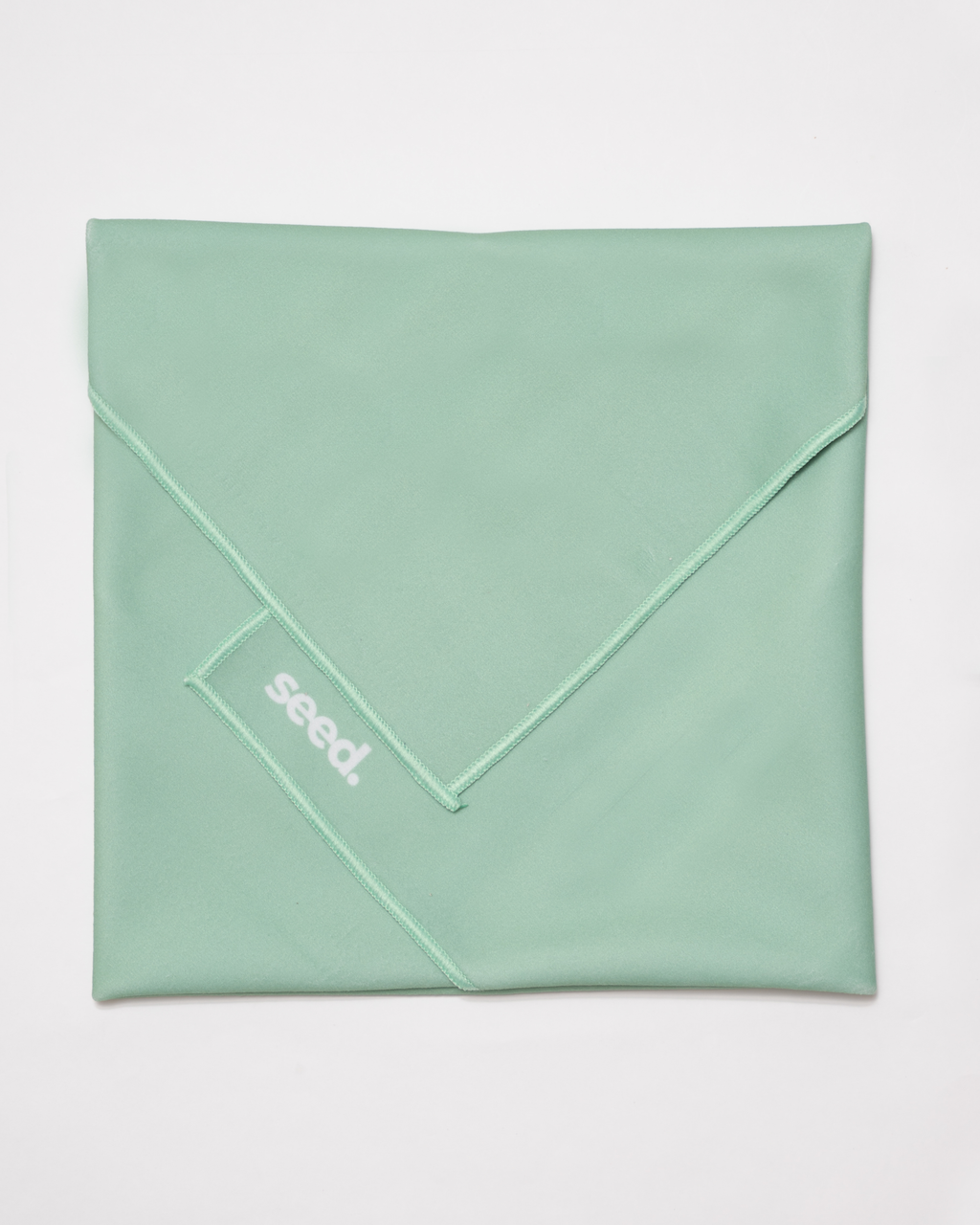 Mint green fabric with 'seed' logo on a white background Hold Up Magic Self Adhesive Wrap Organiser Mint Mojito