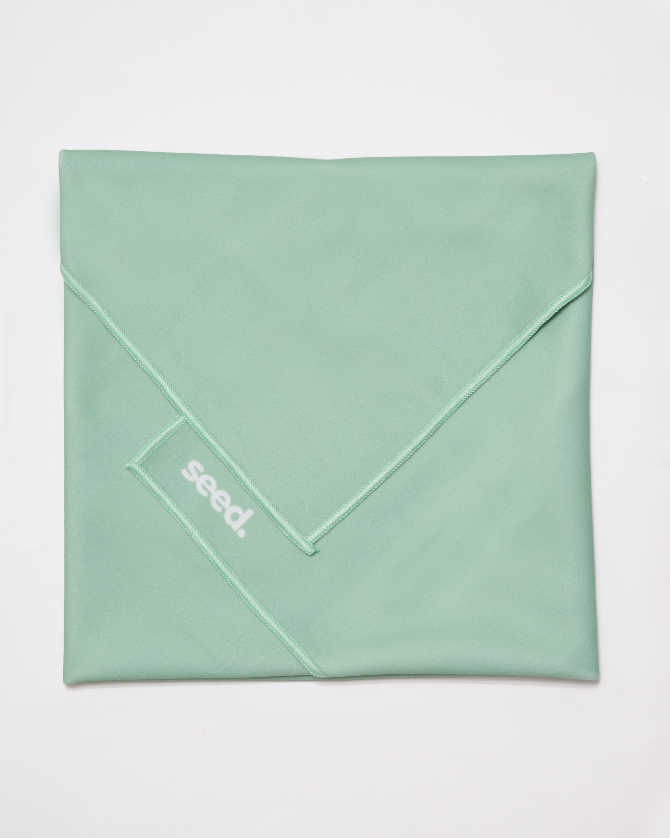 Mint green fabric with 'seed' logo on a white background Hold Up Magic Self Adhesive Wrap Organiser Mint Mojito
