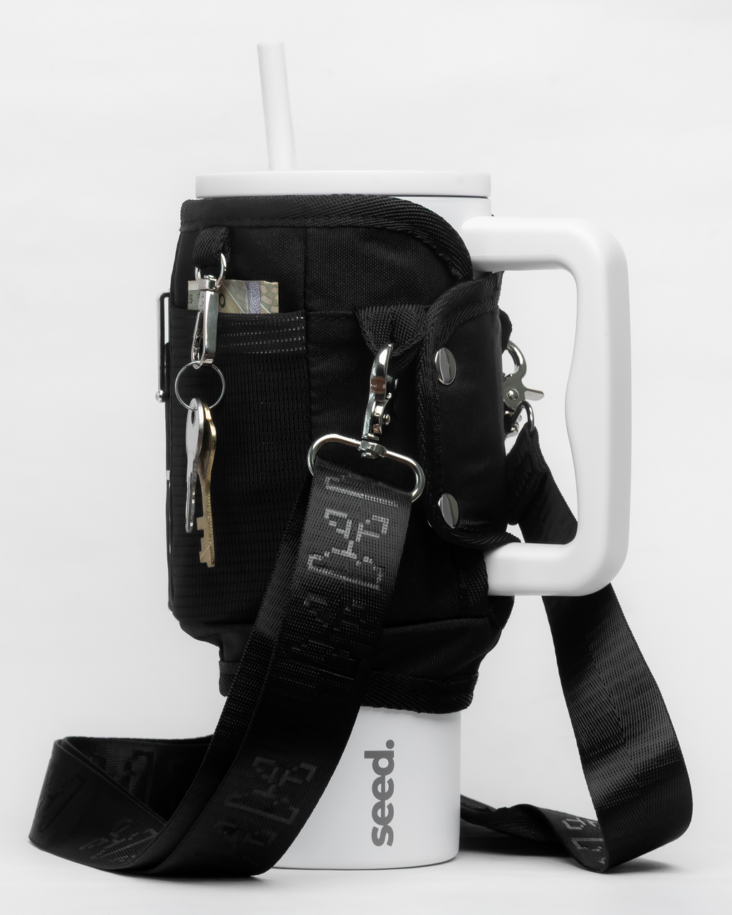 white insulated stainless steel tumbler water bottle with black tumbler sleeve utility sling bag blackhole & moonlight