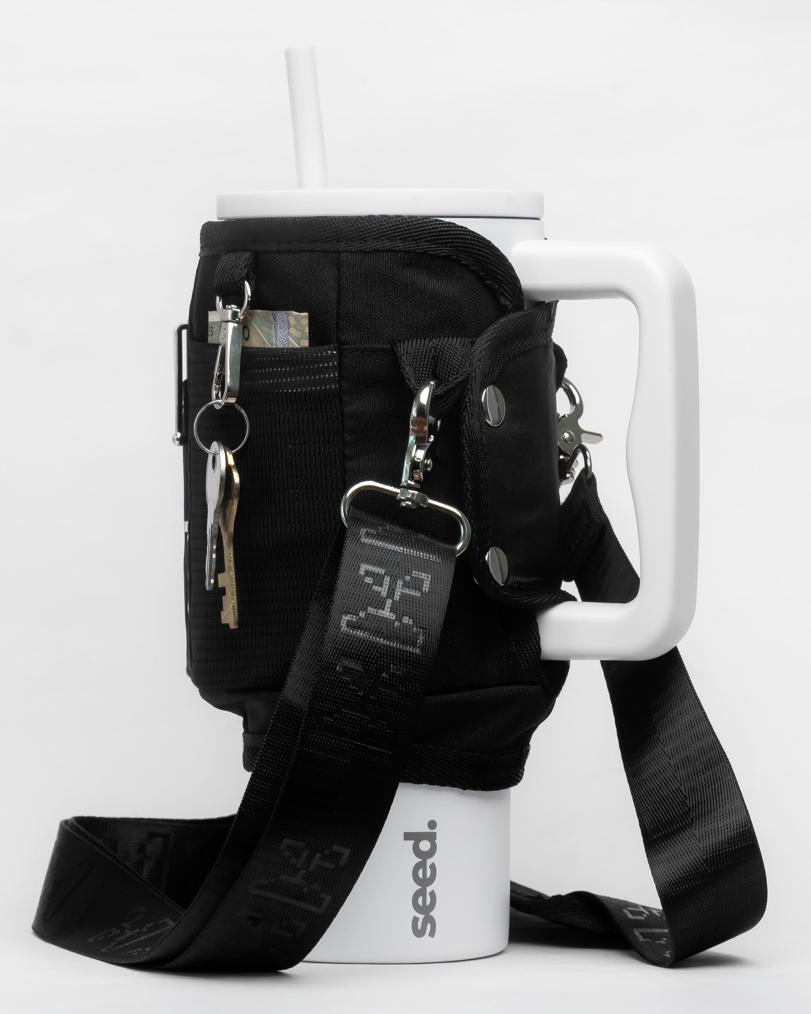 white insulated stainless steel tumbler water bottle with black tumbler sleeve utility sling bag blackhole & moonlight